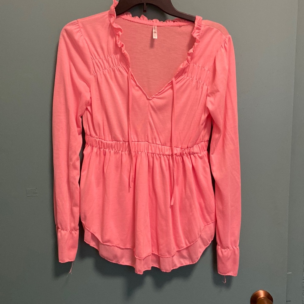 Pink top.